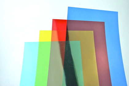 Picture of coloured transparent acetate sheets, red, green, blue and yellow.
